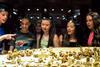 Students look at a model during a school trip to Normandy, France.