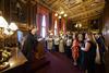 A man gives a lecture to a room full of people in Parliament