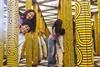 Two kids in a mirror maze