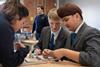 Students put a piece of equipment together at the Derwent Valley Museum of Making