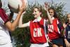 Pupils playing netball