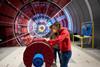 Two children get to grips with an exhibit in the new Science Gateway at CERN in Switzerland