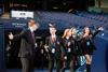 Pupils walking through the tunnel and into the dugout at Manchester City Football Club's Etihad Stadium