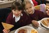 Pupils eating breakfast at Hatton Adventure World