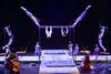 Acrobats perform on bars as part of Cirque du Soleil's performance of Corteo