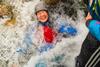 One pupil immersed in water on an Outward Bound Trust residential