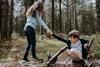 Children helping each other in nature