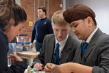 Students put a piece of equipment together at the Derwent Valley Museum of Making