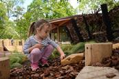 Child enjoying new play area at Horniman Museum and Gardens