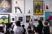 A group of students visit the National Portrait Gallery in London