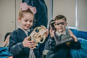 Schoolchildren handle interesting artefacts at Chester Zoo