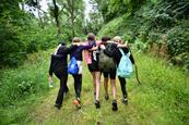 A group of girls head off into the woods during a trip with the YHA