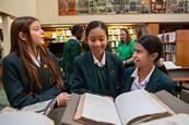 Students from St Marylebone School examine Daily Occurrences at ZSL Library