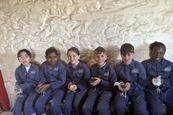 St Woolos Primary School pupils with chicks at the farm