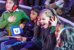 Children wearing ear defenders at Techniquest