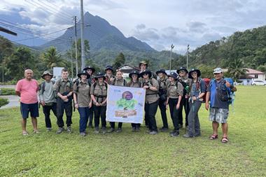 Walsall Academy students and staff show their banner during a Borneo expedition