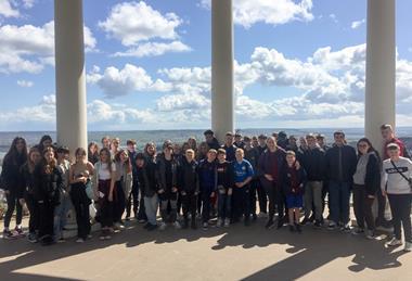 A school group pose for a photo at the Niederwald Monument