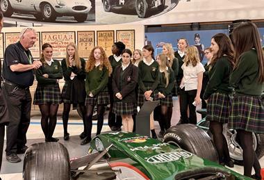 Group of school pupils on a tour of British Motor Museum