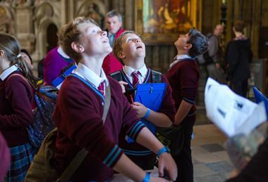 Pupils exploring Westminster Abbey on an educational visit