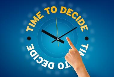 Hand pointing at a Time to Decide clock illustration