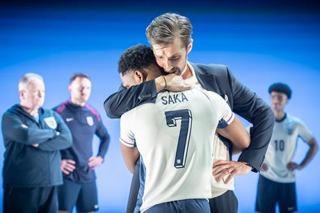 Tane Siah (Bukayo Saka) and Gwilym Lee (Gareth Southgate) in Dear England at the National Theatre