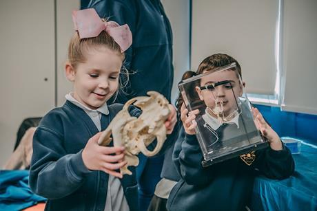 Schoolchildren handle interesting artefacts at Chester Zoo