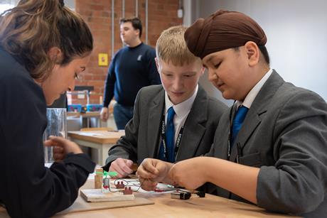 Students put a piece of equipment together at the Derwent Valley Museum of Making