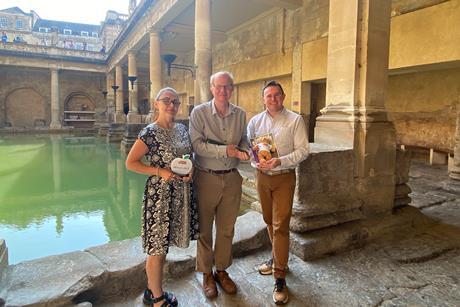 The education team at The Roman Baths with their School Travel Awards trophy and certificate for the Best Venue for History Learning Award