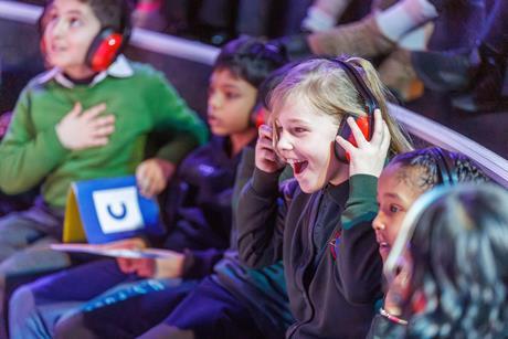 Children wearing ear defenders at Techniquest