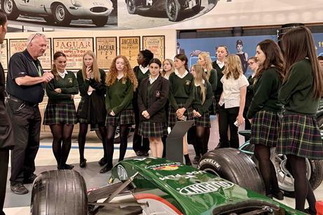 Group of school pupils on a tour of British Motor Museum