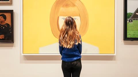 A woman looks at the portrait of Anna Wintour which makes up a new display at the National Portrait Gallery. 