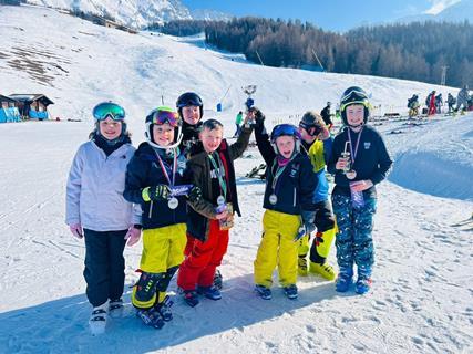 Pupils show off their medals during a school ski trip