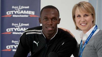 School Travel Awards host Katharine Merry and Usain Bolt