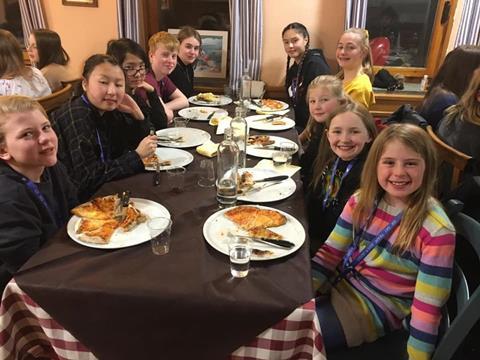 Pizza night on Queen Ethelburga school's ski trip