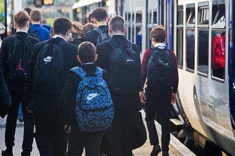 School children travelling on a Northern train