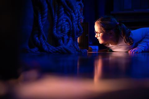 Young girl looking at exhibit in The Story Museum