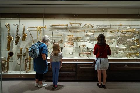 Visitors to St Cecilia's Hall looking at exhibits at the University of Edinburgh