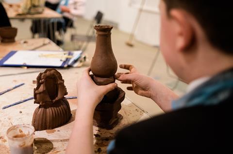 A student makes some pottery at the Potteries Museum & Art Gallery