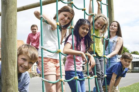 School pupils climbing frame - ING Image