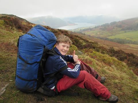 Boy on a hiking school trip