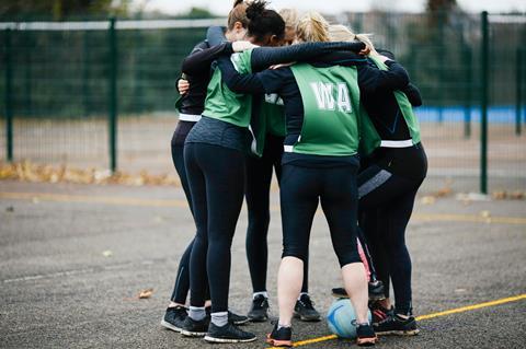 Group of pupils playing netball