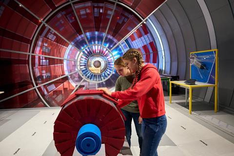 Two children get to grips with an exhibit in the new Science Gateway at CERN in Switzerland