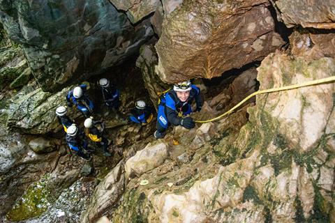 Students taking part in caving during a Lost Earth Adventures residential