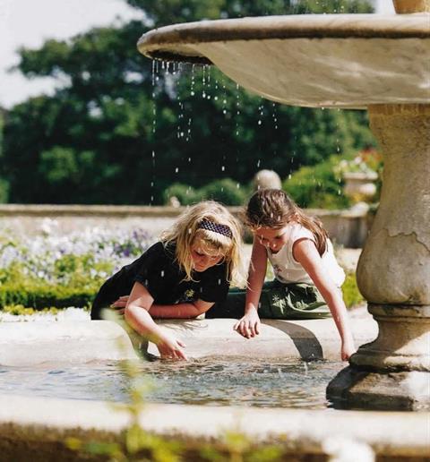 Girls by fountain at Bowood House