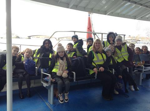Students on board Thames Clippers' catamaran
