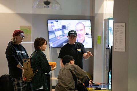 Students watch a screen at the National Videogame Museum