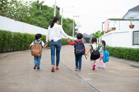 Teacher with students stock