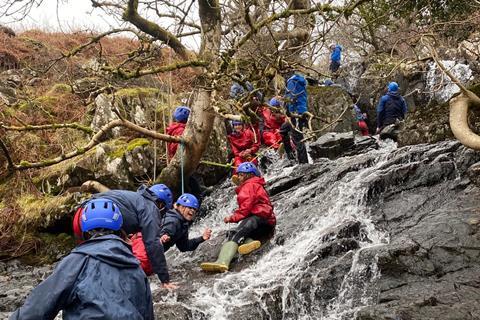 Hammersmith Academy students tackle a rocky river as part of their Outward Bound residential in the Lake District