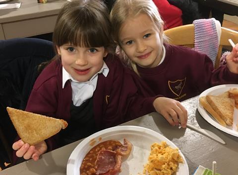 Pupils eating breakfast at Hatton Adventure World