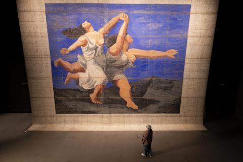 The 1924 front stage cloth for the Ballets Russes’ production, Le Train Bleu, designed by Pablo Picasso at V&A East Storehouse.